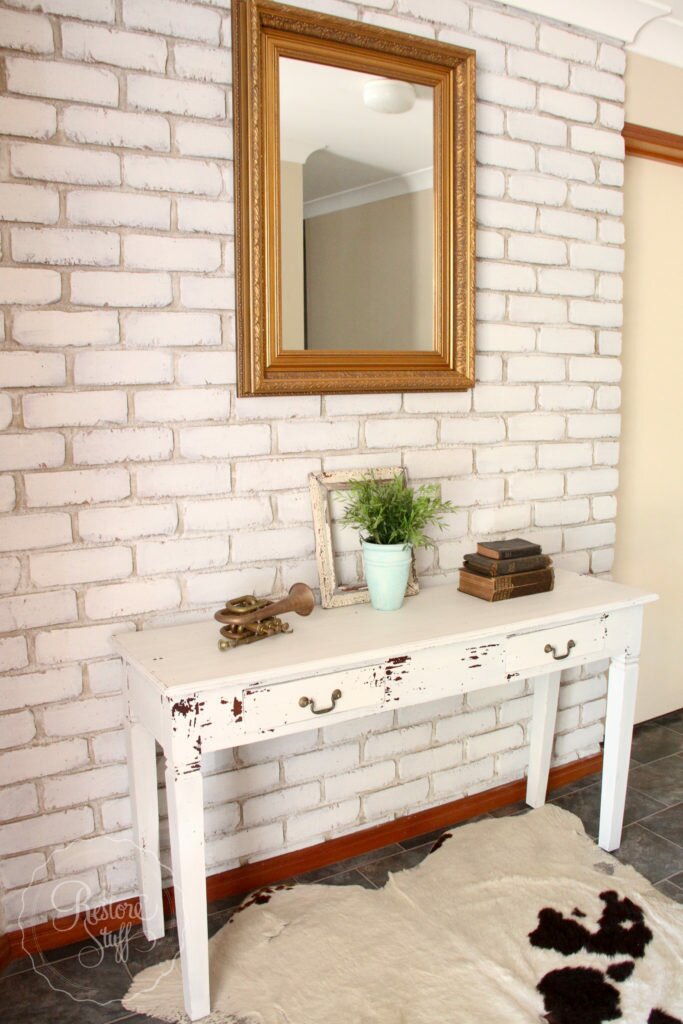 Brick wall painted with milk paint